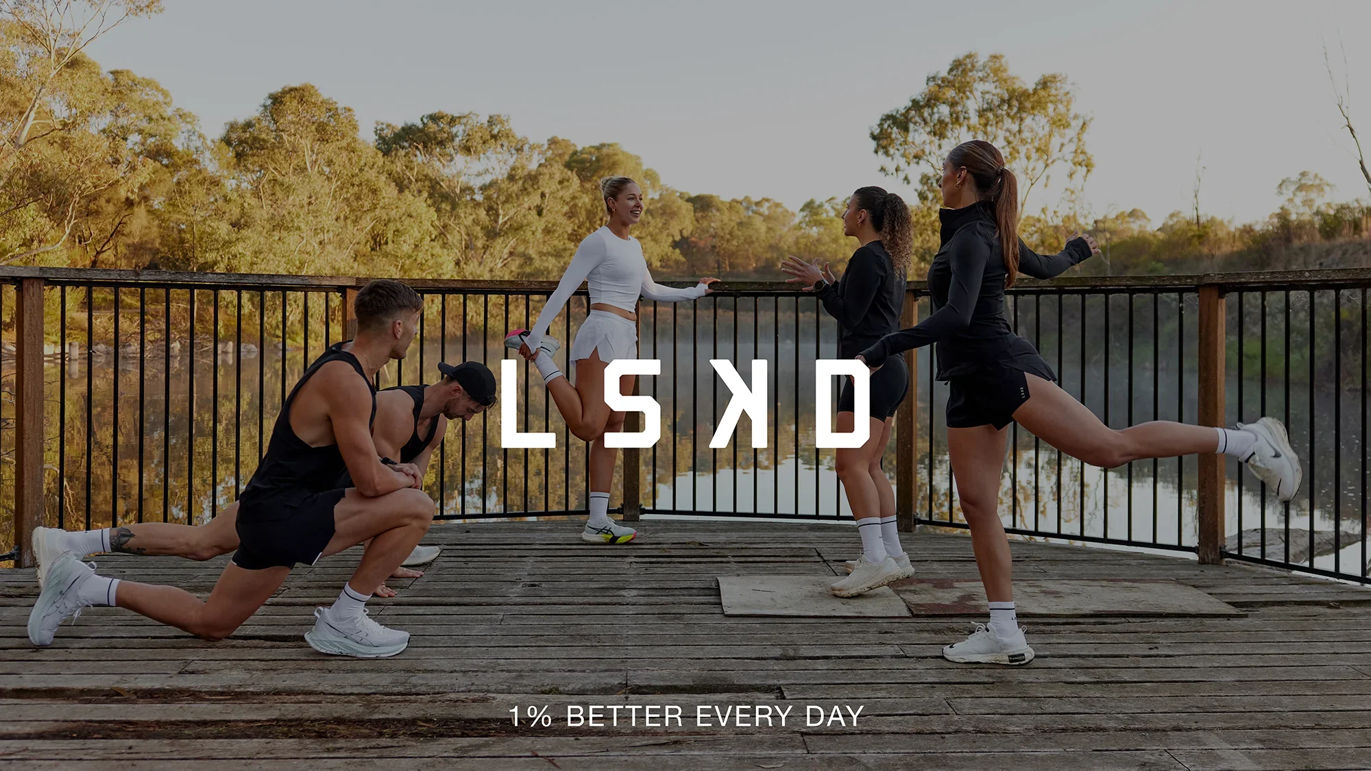 LSKD athletes training together by a river at sunrise, 1% better every day